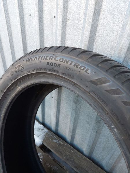 Шини б/у 235 50 R19 Bridgestone Weather Control A005 evo 241494 фото